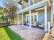 Relax on the spacious brick patio with comfortable seating and beautiful views at 7409 Excitement Dr, Reunion, FL 34747