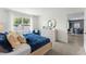 Bright bedroom with large window, soft colors, and comfortable carpeting at 756 Mocking Jay Ln, St Cloud, FL 34771