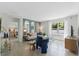 Comfortable living room with large windows, stylish furniture, and tasteful decor at 756 Mocking Jay Ln, St Cloud, FL 34771
