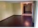 Open-concept living room with hardwood floors and ample space at 8129 Granada Blvd, Orlando, FL 32836