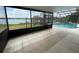 Spacious screened-in patio offering views of the lake and a sparkling pool at 8129 Granada Blvd, Orlando, FL 32836
