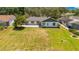 Aerial view of a home and its lush backyard at 9143 San Ambrosio, Orlando, FL 32836