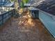 Backyard featuring a screened-in porch, privacy fence, and mature trees at 998 Piedmont Oaks Dr, Apopka, FL 32703