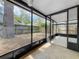 View of a fenced backyard and covered lanai with tile flooring at 998 Piedmont Oaks Dr, Apopka, FL 32703