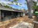 Large backyard with screen porch, privacy fence, and mature trees at 998 Piedmont Oaks Dr, Apopka, FL 32703