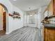 Bright breakfast nook with wood cabinets, bay window, and tile floors at 998 Piedmont Oaks Dr, Apopka, FL 32703