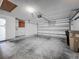 Spacious two car garage with an automatic door opener and built in storage cabinets at 998 Piedmont Oaks Dr, Apopka, FL 32703