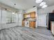 Charming kitchen includes updated appliances, wood cabinetry, and bay window at 998 Piedmont Oaks Dr, Apopka, FL 32703