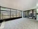 A roomy lanai featuring tile floors and views of the fenced in backyard at 998 Piedmont Oaks Dr, Apopka, FL 32703