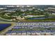 Aerial view of a community with pools and surrounding attractions nearby at 10436 Ebb Tide Lane, Orlando, FL 32821