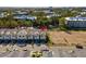 Aerial view of townhomes with a red marker indicating the property location at 10436 Ebb Tide Lane, Orlando, FL 32821