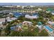 Expansive aerial view shows a property near the SeaWorld theme park and surrounding hotels and other businesses at 10436 Ebb Tide Lane, Orlando, FL 32821