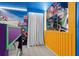 View of the bedroom with colorful mural art and bunk beds at 10436 Ebb Tide Lane, Orlando, FL 32821