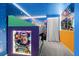 Colorful bedroom featuring mural art and bunk beds at 10436 Ebb Tide Lane, Orlando, FL 32821