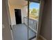 Balcony with white rails and black door overlooking the community at 1055 S Hiawassee Rd # 2018, Orlando, FL 32835