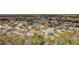 Panoramic aerial view of a residential area featuring homes with screened pools, showcasing a vibrant community at 1176 Liberty Hall Dr, Kissimmee, FL 34746