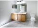 Bathroom features double vanity with marble countertops, and updated fixtures for a modern look at 1176 Liberty Hall Dr, Kissimmee, FL 34746