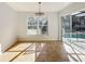Bright and airy dining area with a slider to the pool and view to the yard at 1176 Liberty Hall Dr, Kissimmee, FL 34746