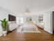 Spacious bedroom with hardwood floors, a ceiling fan, and lots of natural light at 1176 Liberty Hall Dr, Kissimmee, FL 34746