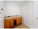 Bathroom vanity with storage cabinets and laminate countertop at 1176 Liberty Hall Dr, Kissimmee, FL 34746