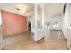 Spacious living room featuring tile floors, decorative columns, and lots of natural light at 12213 Bohannon Blvd, Orlando, FL 32824