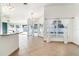 Spacious living room featuring tile floors, lots of natural light, and adjacent dining area at 12213 Bohannon Blvd, Orlando, FL 32824