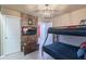 This bedroom features Potter-themed decor with a bunk bed and television set for entertainment at 136 Jetty Way, Davenport, FL 33897