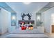 Adorable bedroom featuring themed decor, comfortable bedding, and a cozy ambiance at 136 Jetty Way, Davenport, FL 33897