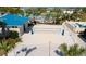 Well-maintained sand volleyball court with a net, perfect for recreational activities at 136 Jetty Way, Davenport, FL 33897