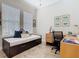 This room provides versatile options as a bedroom or dedicated office space at 1410 Resolute St, Celebration, FL 34747