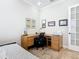 Bedroom or office with a neutral color palette and ample natural light at 1410 Resolute St, Celebration, FL 34747