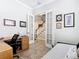 Bedroom or office with French doors and a view into the stairway at 1410 Resolute St, Celebration, FL 34747
