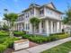 Picturesque community featuring charming townhomes, lush landscaping, and a welcoming neighborhood atmosphere at 1410 Resolute St, Celebration, FL 34747