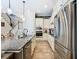 Open kitchen layout with stainless appliances, a large island, and ample counter space for cooking at 1410 Resolute St, Celebration, FL 34747