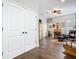 Cozy living area with beautiful hardwood floors, comfortable seating and a ceiling fan at 1410 Resolute St, Celebration, FL 34747