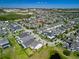 A residential neighborhood with neatly arranged homes and a pond in the distance at 14188 Walcott Ave, Orlando, FL 32827