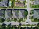 Birds-eye view showing a quiet neighborhood with tree-lined streets and well-maintained homes at 14188 Walcott Ave, Orlando, FL 32827
