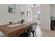 Bright dining room with tile floor, large table, white walls, and lots of light at 14188 Walcott Ave, Orlando, FL 32827