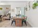 Beautiful open-concept living space with dining area and stairs in the background at 14188 Walcott Ave, Orlando, FL 32827