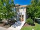 Inviting home featuring a colorful door, well-maintained landscaping, and a welcoming entrance at 14188 Walcott Ave, Orlando, FL 32827