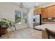 Bright nook with large windows, stylish cabinetry and stainless steel refrigerator at 14188 Walcott Ave, Orlando, FL 32827