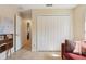 Spacious bedroom area featuring closet space and adjacent hallway, offering comfortable living quarters at 149 Southern Breeze Dr, Minneola, FL 34715