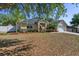 Well-maintained one story home with a two car garage, healthy lawn, and decorative landscaping at 149 Southern Breeze Dr, Minneola, FL 34715