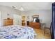 Spacious main bedroom featuring tile flooring and a neutral color palette at 149 Southern Breeze Dr, Minneola, FL 34715