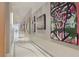 Hallway featuring multiple paintings at 150 E Robinson St # 1219, Orlando, FL 32801
