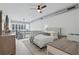 Bright main bedroom with modern decor, lofted layout, and spiral staircase access at 150 E Robinson St # 1219, Orlando, FL 32801