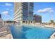 Rooftop pool with lounge chairs at 150 E Robinson St # 1219, Orlando, FL 32801