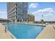 Relax poolside with stunning skyline views at this building's luxurious rooftop pool at 150 E Robinson St # 1219, Orlando, FL 32801