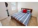 Bedroom features carpeted flooring, a window and dart board art at 156 Eagleview Loop, Davenport, FL 33837