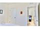 Bedroom features neutral colors, tile flooring and view into a second bedroom at 156 Eagleview Loop, Davenport, FL 33837